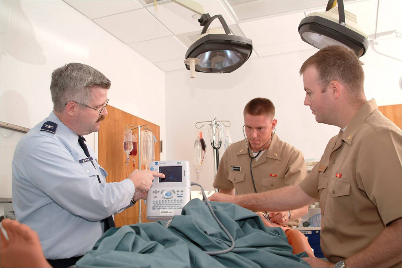 military personnel performing a medical evaluation